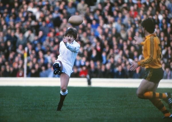 Stuart Barnes kicks ahead for England against Australia in 1984