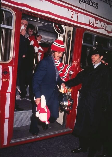 Sunderland captain Bobby Kerr gets of the open top bus with the FA Cup in 1973