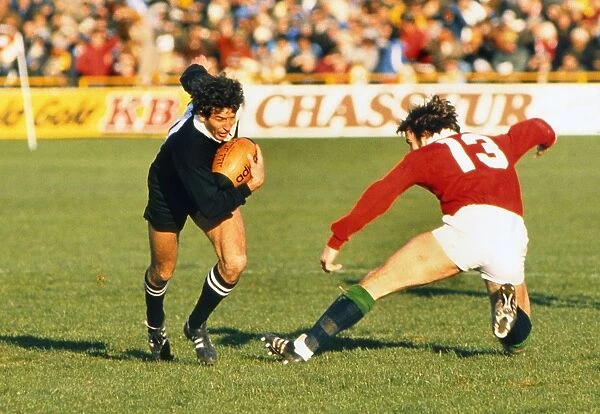 Wayne Smith makes a break for the All Blacks against the Lions in 1983