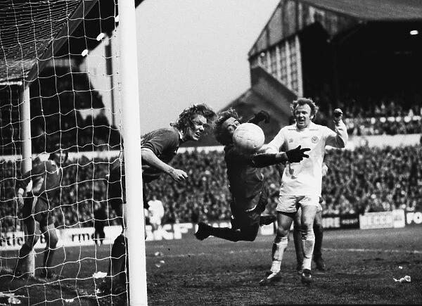 Wimbledon keeper Dickie Guy saves from Billy Bremner in the 1975 FA Cup