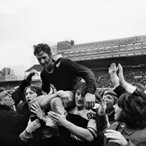 All Black captain Ian Kirkpatrick is chaired off the field by Barbarians players in 1973