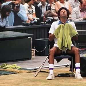 Arthur Ashe on the way to winning the Wimbledon title in 1975