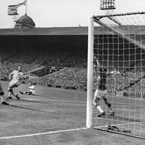 Aston Villas Peter McParland scores his second goal in the 1957 FA Cup Final