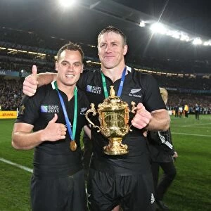 Brad Thorn and Isreal Dagg with the Webb Ellis Cup