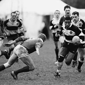 Chris Oti makes a break for the Barbarians in the 1989 Mobbs Memorial Match
