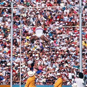 Daley Thompson soars over the bar during the decathlon pole vault at the 1984 Olympics