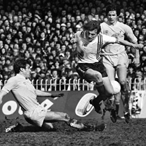 Emlyn Hughes slides in to tackle Steve Coppell during the 1979 FA Cup semi-final