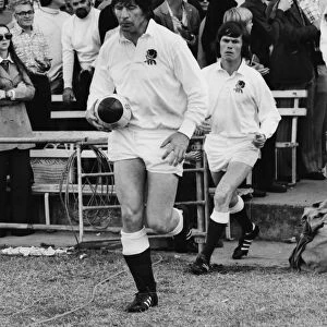 Englands captain John Pullin runs out to face Australia in 1975