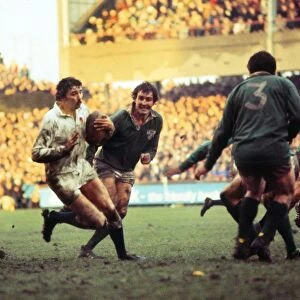 Englands Martin Cooper makes a break against Ireland - 1977 Five Nations