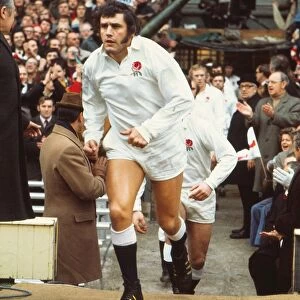 Englands Mike Burton runs out at Twickenham during the 1974 Five Nations