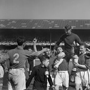 Everton goalkeeper Ted Sagar is chaired off by his teammates after his last game for the club