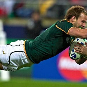 Francois Hougaard scores South Africas winning try over Wales at the 2011 World Cup