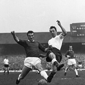 Jimmy Greaves and Noel Cantwell compete for the ball in the 1962 FA Cup semi-final