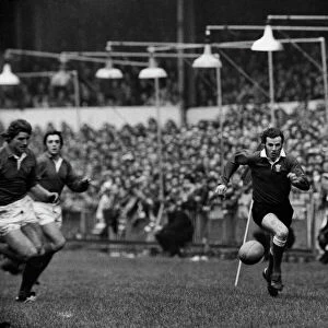 JJ Williams chases a kick ahead during the 1974 Five Nations