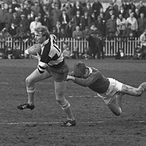 John Spencer makes a break for the Barbarians in the 1969 Mobbs Memorial Match