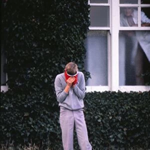Ken Brown puts his head in his hands after losing his match at the last hole in the 1977 Ryder Cup