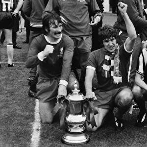 Liverpools Tommy Smith, Emlyn Hughes and Phil Thompson celebrate victory - 1974 FA Cup Final