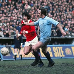 Manchester Uniteds Willie Morgan and Coventrys Roy Barry