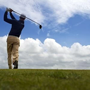 Martin Kaymer tees of during the 2011 Open Championship