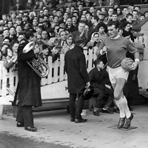 Noel Cantwell leads out Manchester United during the 1963 FA Cup