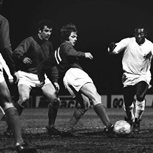 Pele of Santos and Fulhams Les Barrett and Alan Mullery