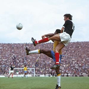 Scotlands Joe Jordan wins a header against Brazil in 1973