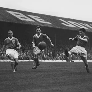 Stanley Matthews competes with John Bramwell and Bobby Collins for the ball in 1958