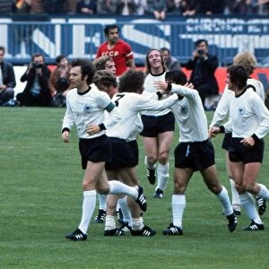 The West German players congratulate Gerd Muller after he opens the scoring the in Euro 72 final