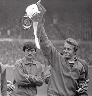 George Best and Denis Law, with the league championship trophy, in 1967 George Best and Denis Law, with the league championship trophy, in 1967