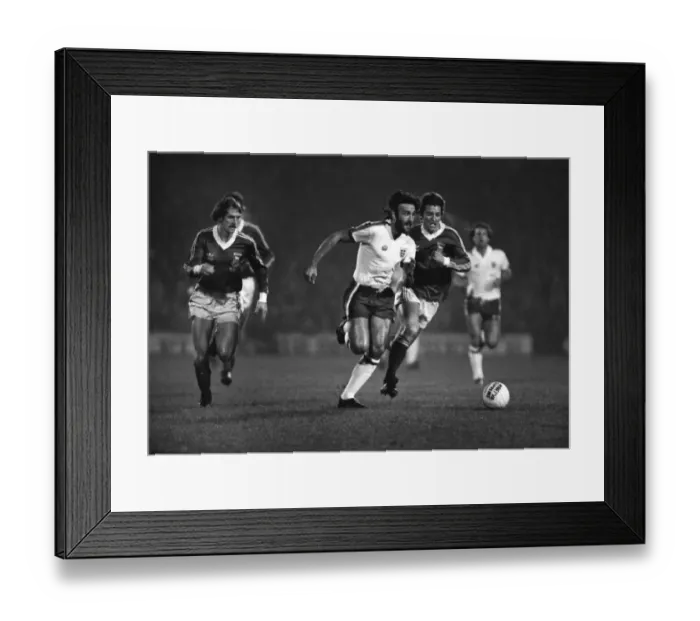 Framed Print : Ricky Villa sprints on the ball while playing for an England XI in 1979