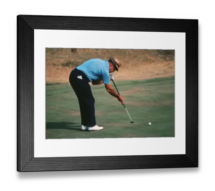 Framed Print : Sam Snead demonstrating his split-grip, side-saddle putting technique Framed Print : Sam Snead demonstrating his split-grip, side-saddle putting technique