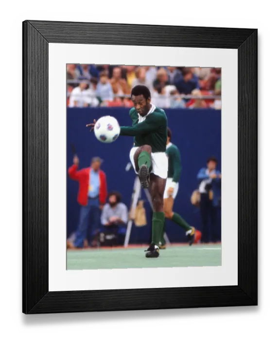 Framed Print : Pele plays a pass in his farewell game Framed Print : Pele plays a pass in his farewell game
