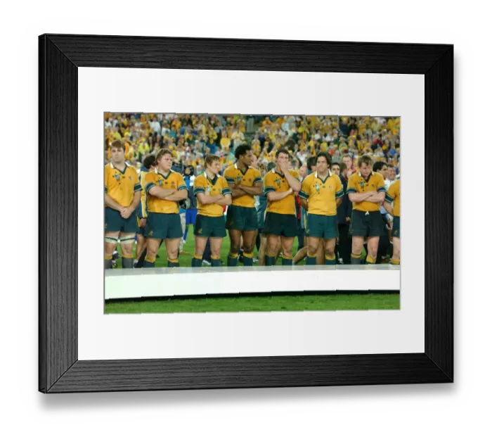 Framed Print : Dejected Australian players line up to receive their losers medals Framed Print : Dejected Australian players line up to receive their losers medals