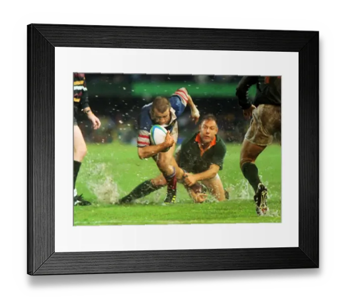 Framed Print : Fabien Galthie attempts to make a break in the rain-soaked 1995 Rugby World Cup semi-final Framed Print : Fabien Galthie attempts to make a break in the rain-soaked 1995 Rugby World Cup semi-final