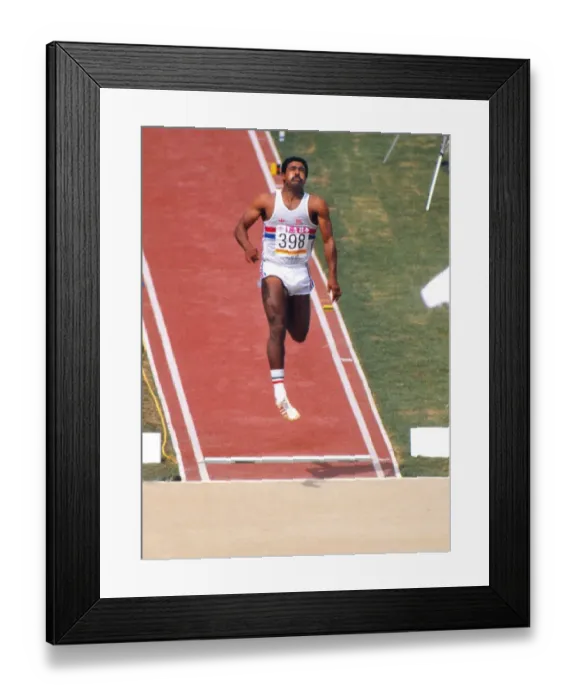 Framed Print : Daley Thompson in the long jump on the way to decathlon gold in 1984 Framed Print : Daley Thompson in the long jump on the way to decathlon gold in 1984