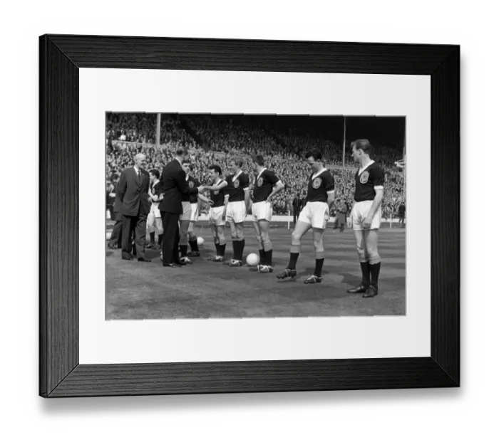 Framed Print : Prince Phillip shakes hands with Denis Law during the 1961 Home Championship Framed Print : Prince Phillip shakes hands with Denis Law during the 1961 Home Championship