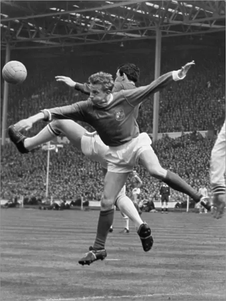 Denis Law and Gordon Banks clash during the 1963 FA Cup Final
