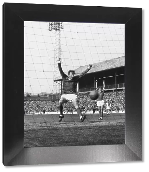 Denis Law celebrates a Manchester United goal in 1965