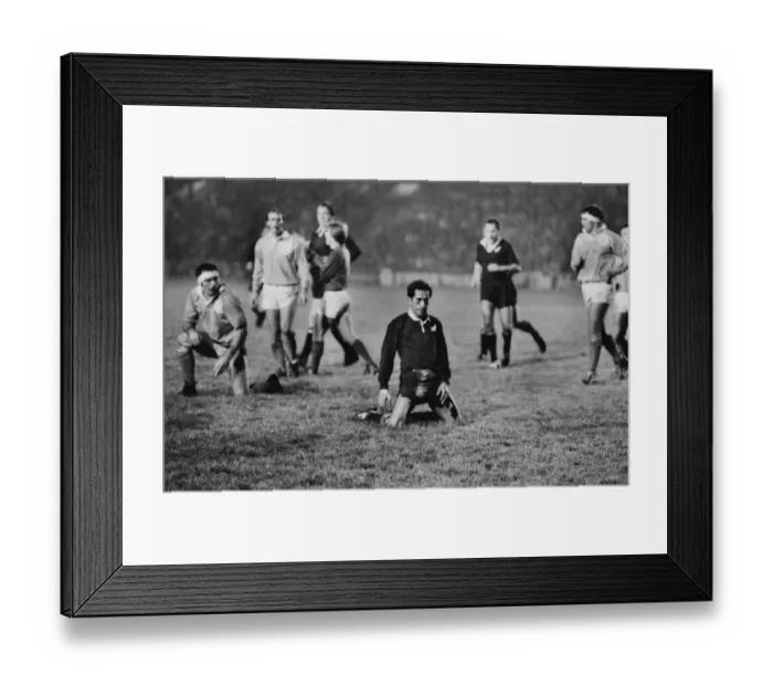Framed Print : New Zealand centre Steve Pokere drops to his knees after he over-hits his kick ahead against the Midlands in 1983