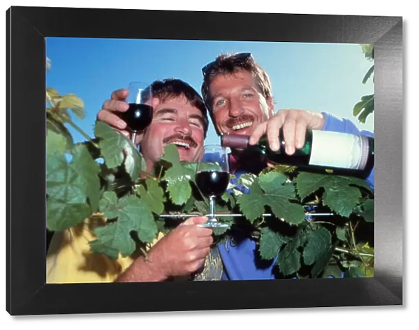 Ian Botham and Allan Lamb drink some wine during the 1992 World Cup