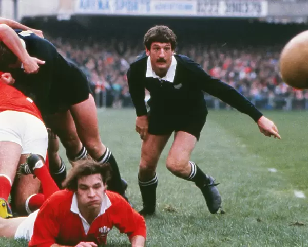 Wales Terry Holmes gets the ball away against the All Blacks in 1980 under pressure from Graham Mourie