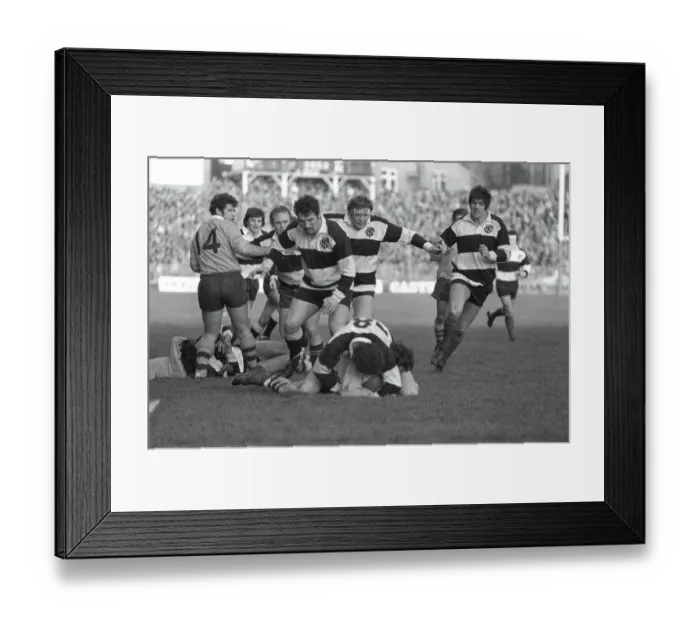 Framed Print : Mervyn Davies tackles an Australian player for the Barbarians in 1976 with his teammates moving in in support Framed Print : Mervyn Davies tackles an Australian player for the Barbarians in 1976 with his teammates moving in in support