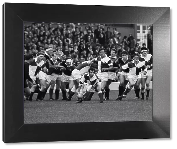 Gareth Edwards passes the ball out during the RFU Centenary Match in 1970