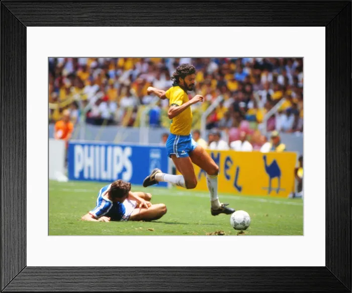 Framed Print : Scorates evades a tackle at the 1986 World Cup Framed Print : Scorates evades a tackle at the 1986 World Cup