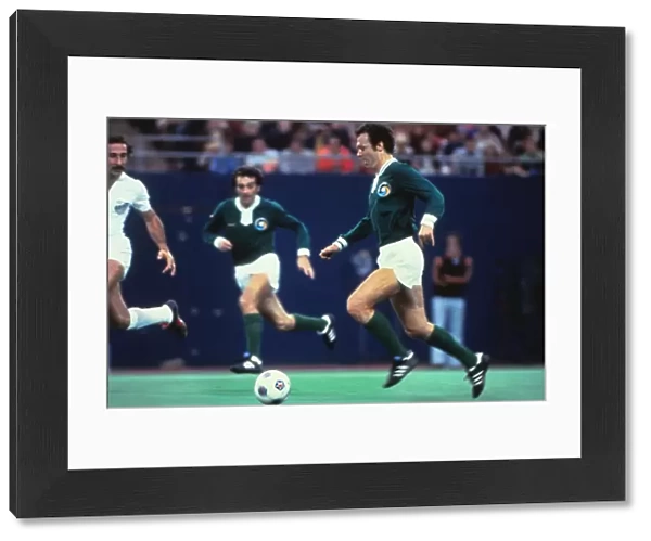 Franz Beckenbauer on the ball in Peles farewell game in 1977