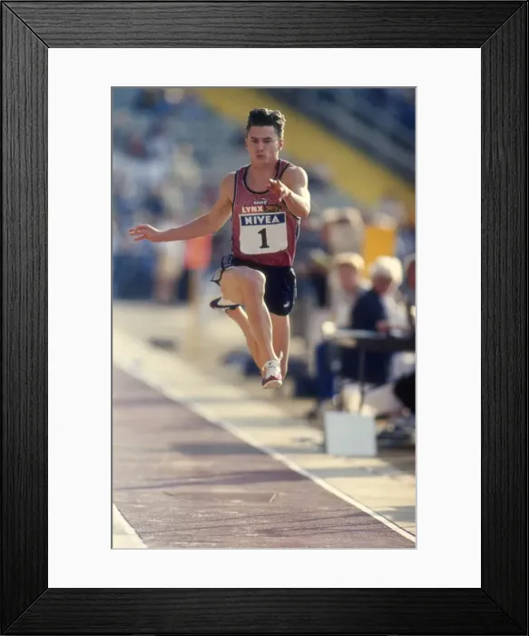 Framed Print : Jonathan Edwards in action in 1998 Framed Print : Jonathan Edwards in action in 1998