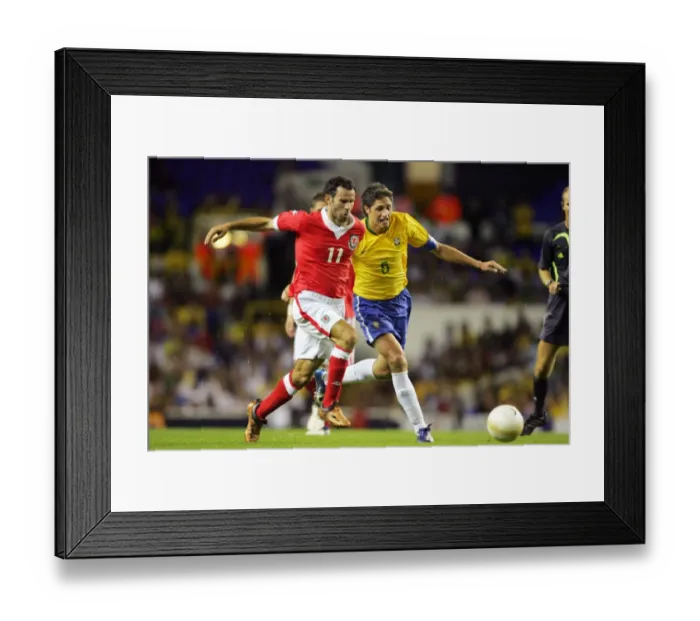 Framed Print : Ryan Giggs takes on Brazil Framed Print : Ryan Giggs takes on Brazil