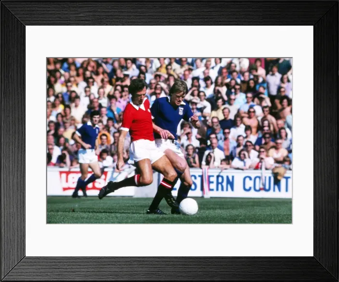 Framed Print : Manchester Uniteds David Sadler and Ipswich Towns Trevor Whymark Framed Print : Manchester Uniteds David Sadler and Ipswich Towns Trevor Whymark