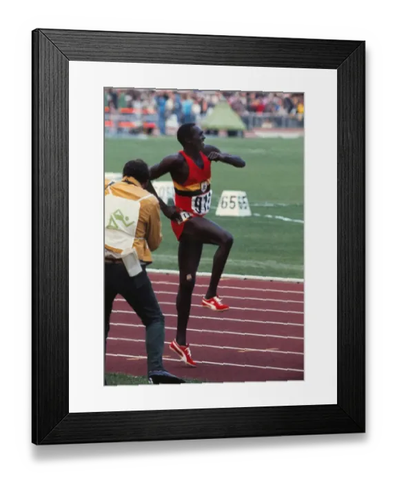 Framed Print : Ugandas John Akii-Bua celebrates his gold medal in the 400m hurdles at the 1972 Munich Olympics Framed Print : Ugandas John Akii-Bua celebrates his gold medal in the 400m hurdles at the 1972 Munich Olympics