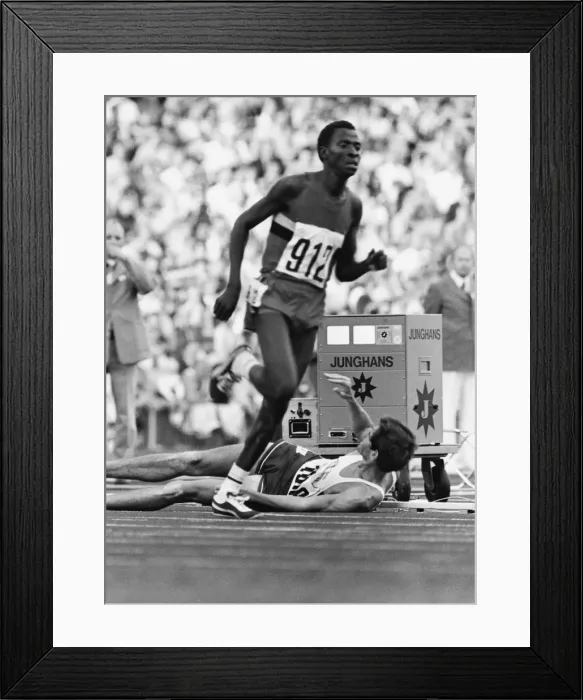 Framed Print : Jim Ryun falls at the 1972 Munich Olympics Framed Print : Jim Ryun falls at the 1972 Munich Olympics